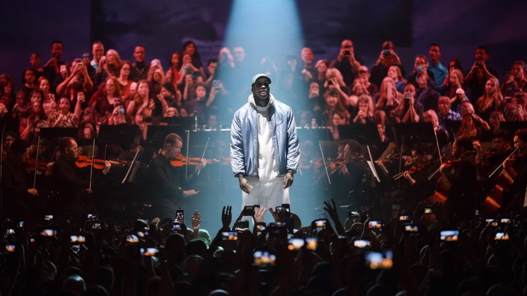 Nas live at Chastain Park with full orchestra during his 2025 Atlanta concert performance